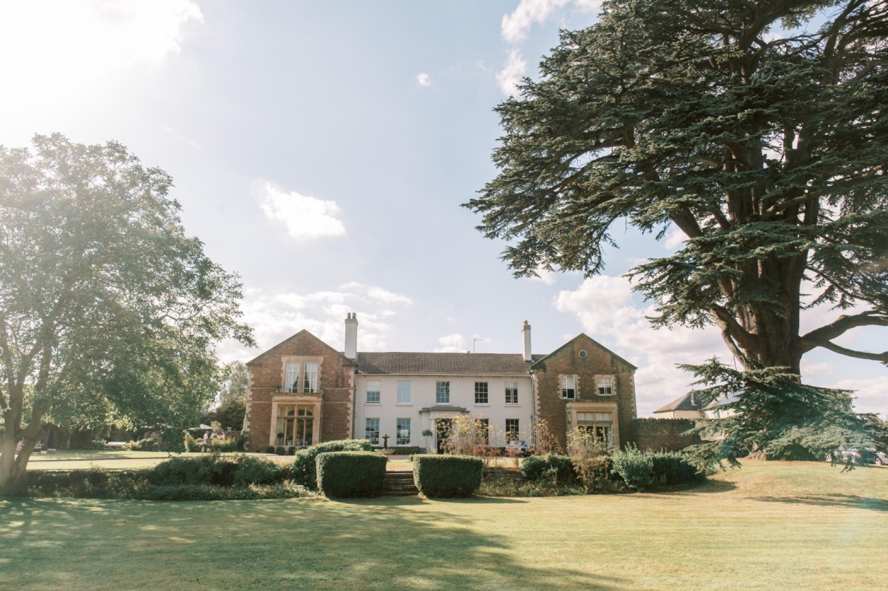 The Glewstone Court manor with the 500-year-old Cedar of Lebanon by the driveway